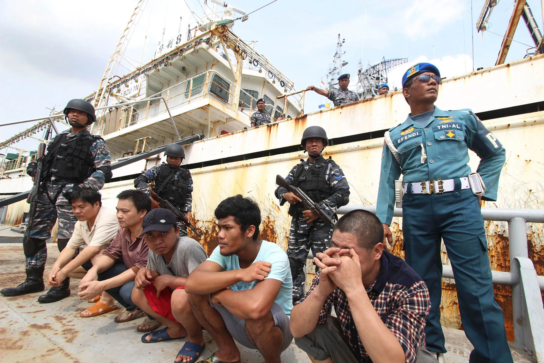 Indonesian navy detains crew members of a Chinese trawler in North Sumatra in April 2016. More Chinese fishing boats have been detected in the vicinity this year.
