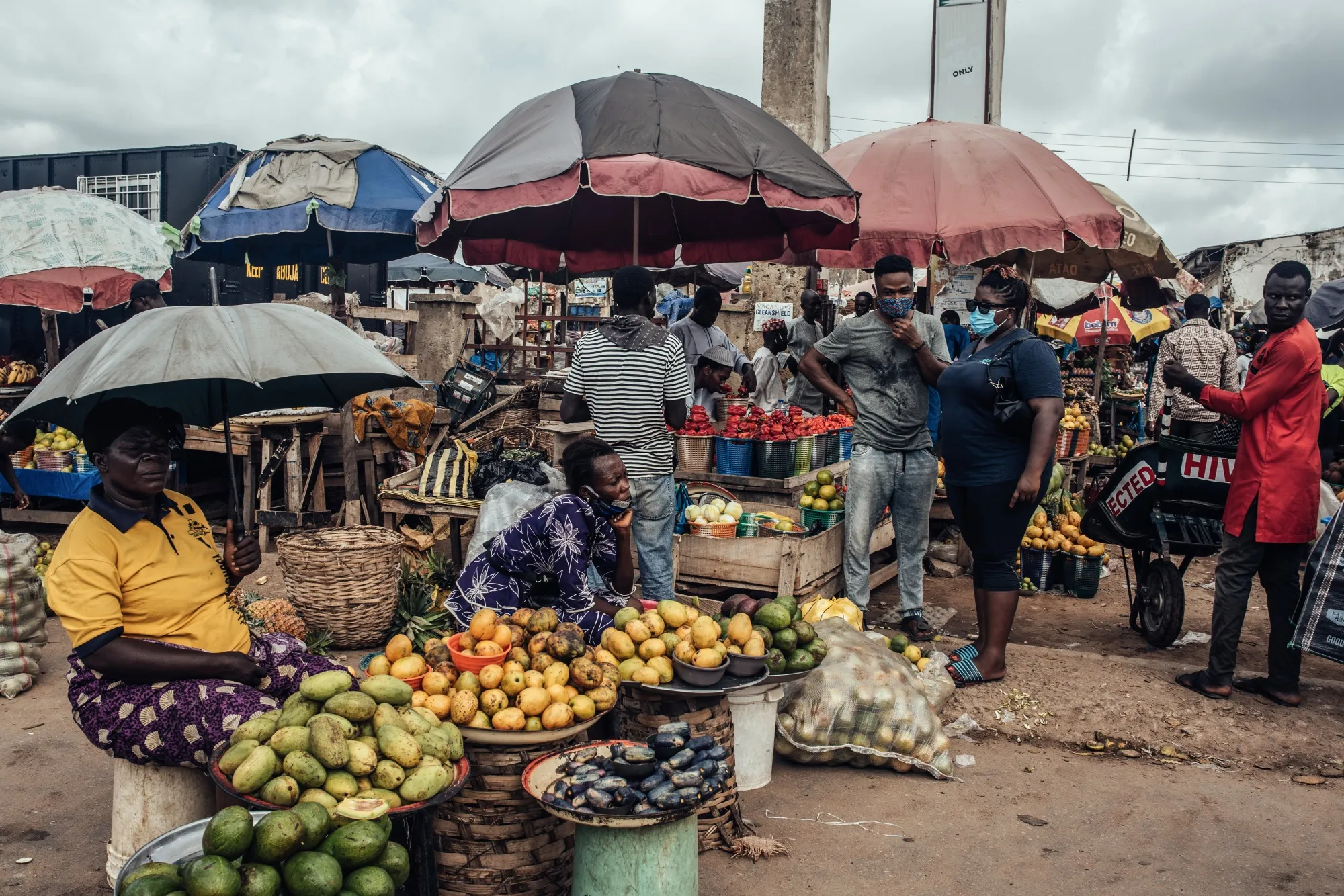 Vendors sell fresh produce on stalls at Utako Ultra Modern market in Abuja, Nigeria.