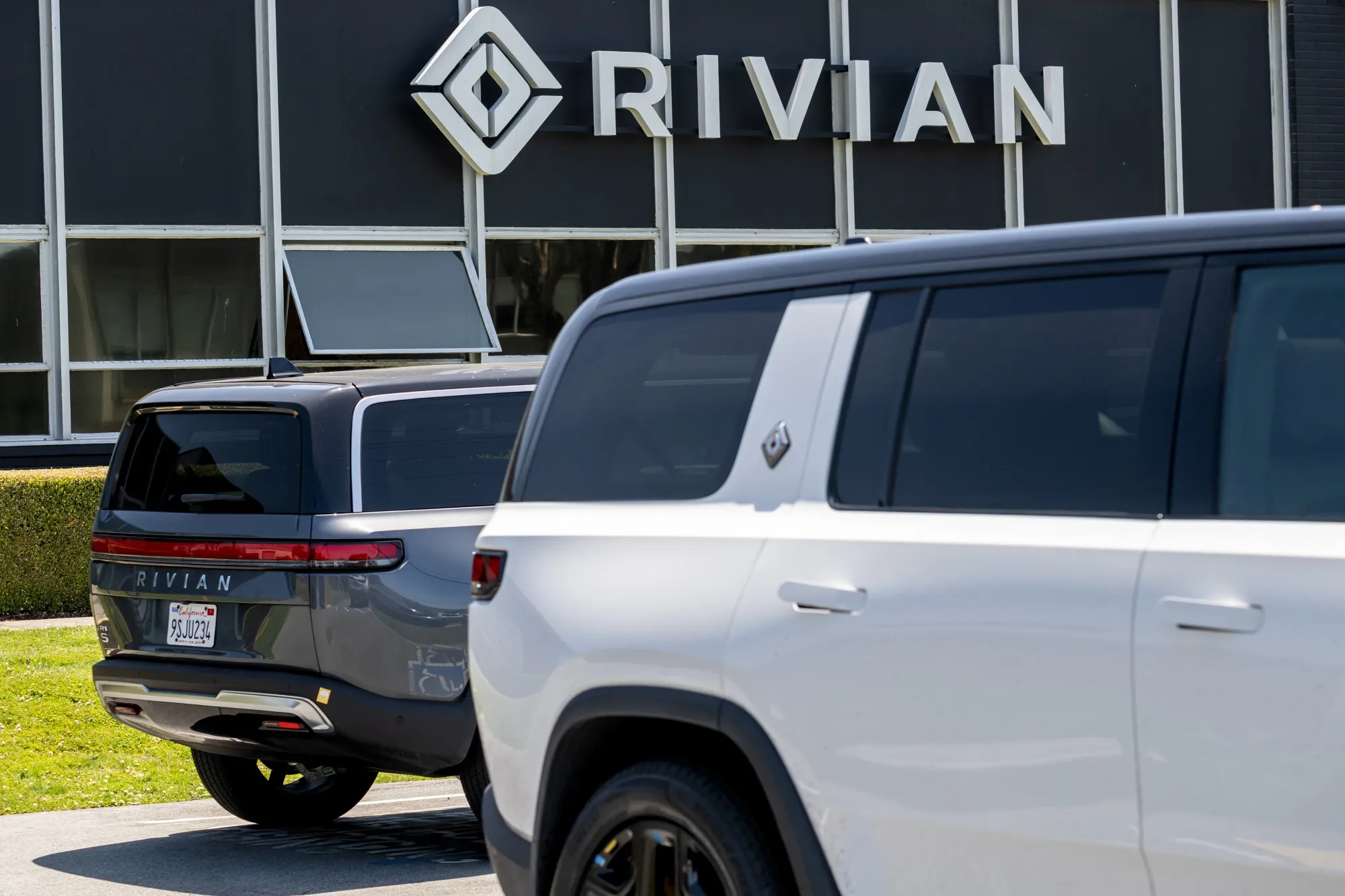 Rivian vehicles at a dealership and service center in San Francisco.