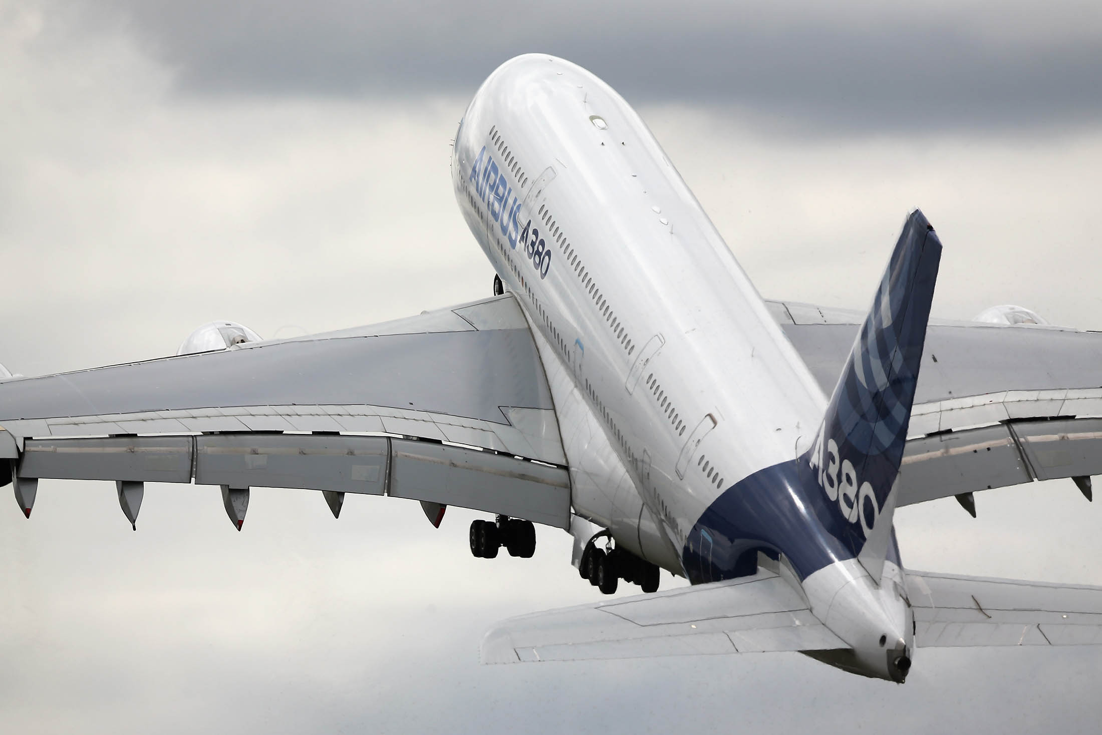 FARNBOROUGH, ENGLAND - JULY 16: A Boeing A380 performs in an aerial flying display on day four of the Farnborough International Airshow on July 16, 2014 in Farnborough, England. The Farnborough International Airshow is the biggest event of it's kind attracting people from all over the world.
