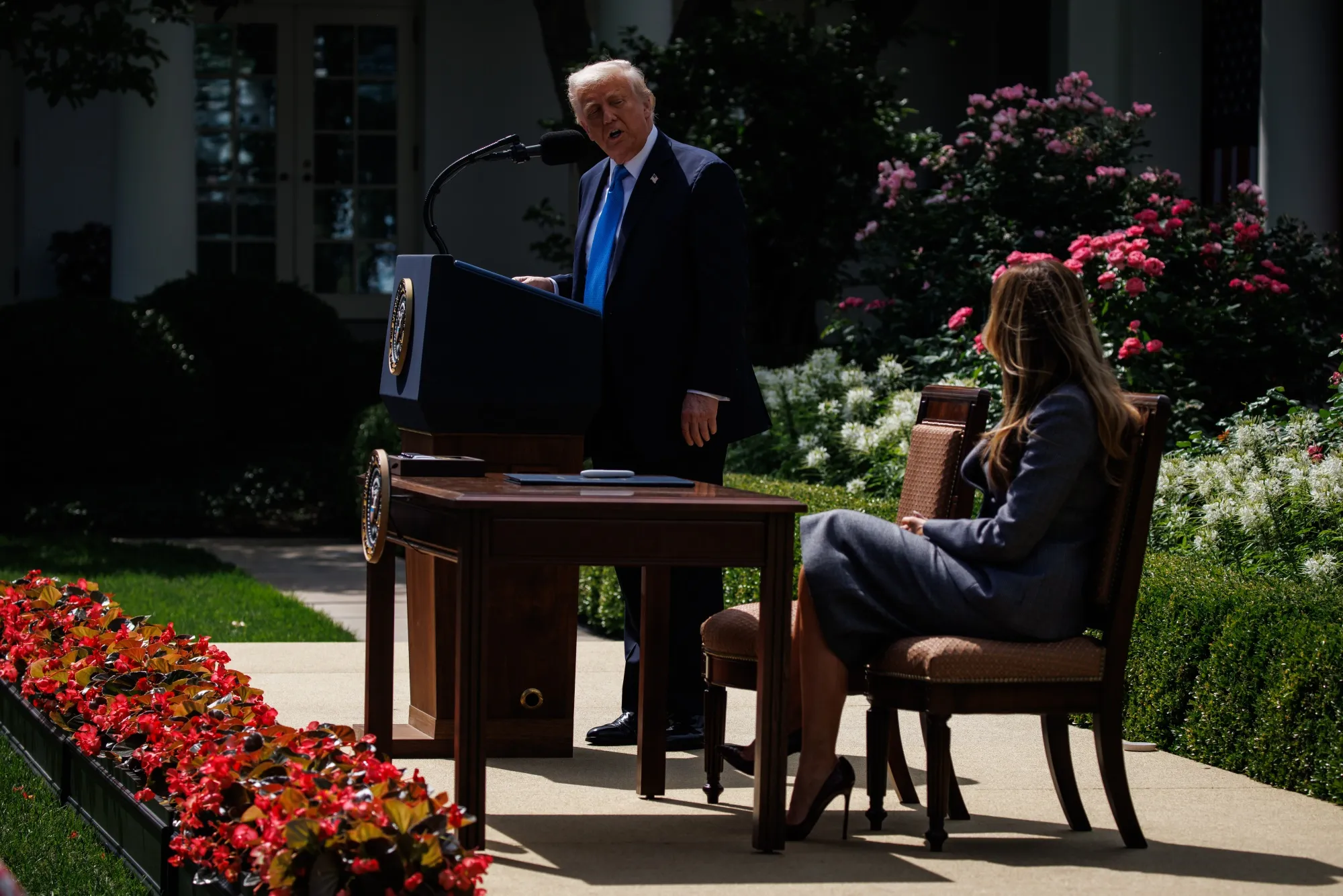 President Donald Trump speaks alongside&nbsp;First Lady Melania Trump during a signing ceremony for the Take It Down Act, on May 19. Trump&nbsp;signed a bill to force social media companies to remove non-consensual sharing of explicit sexual imagery online, calling it a “horribly wrong” situation.