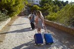 Tourist pull their luggage to a hotel&nbsp;in Hydra, on Oct. 5.