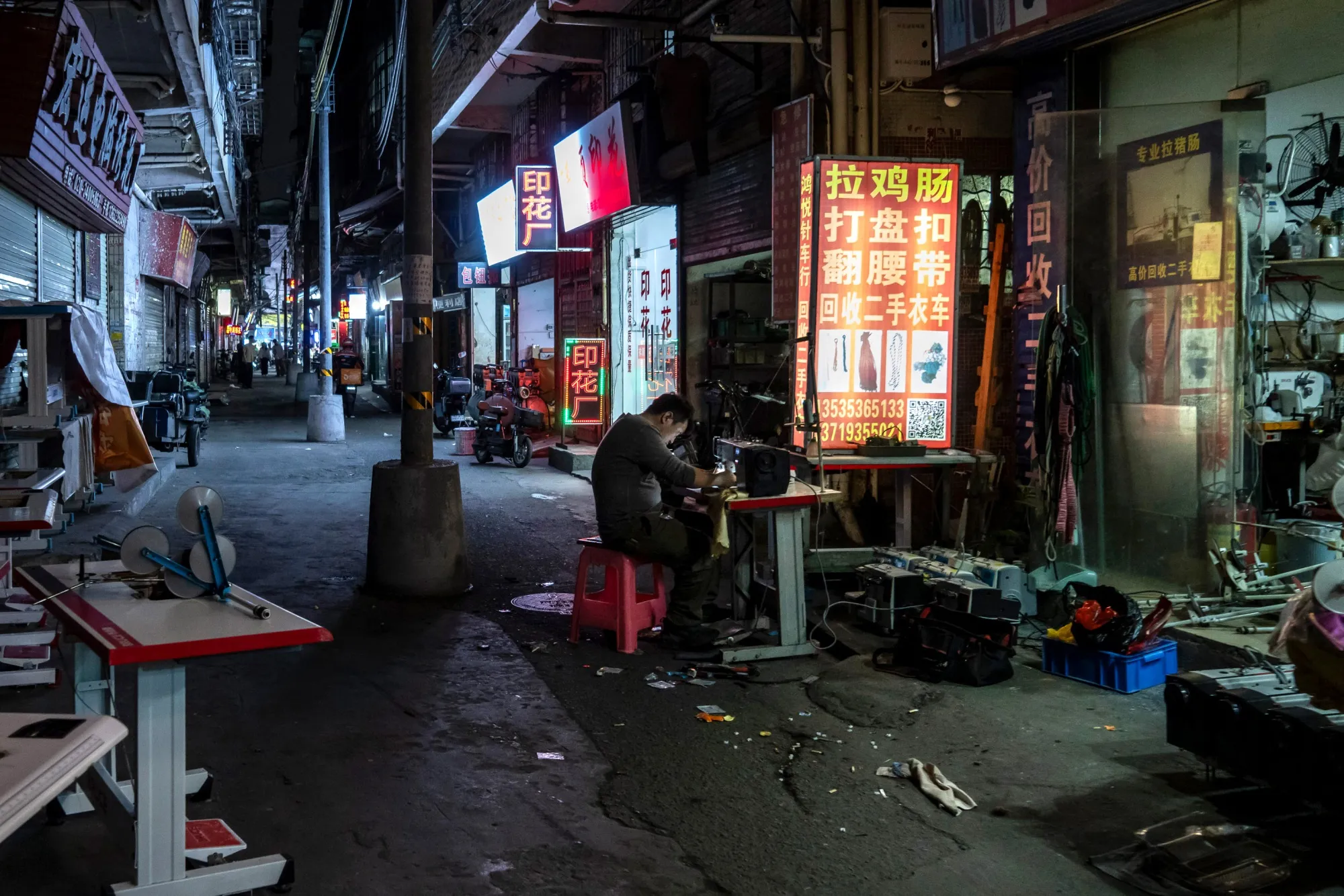 Evening activities in Datang, an urban village in the middle of the city and home to countless small low end garment workshops in Guangzhou, China on Feb. 27.&nbsp;