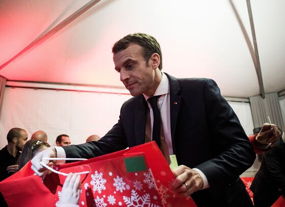 Macron's Little Helper CEOs Spread Holiday Cheer With Bonuses