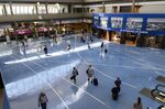 People walk through the Pittsburgh International Airport on July 2.