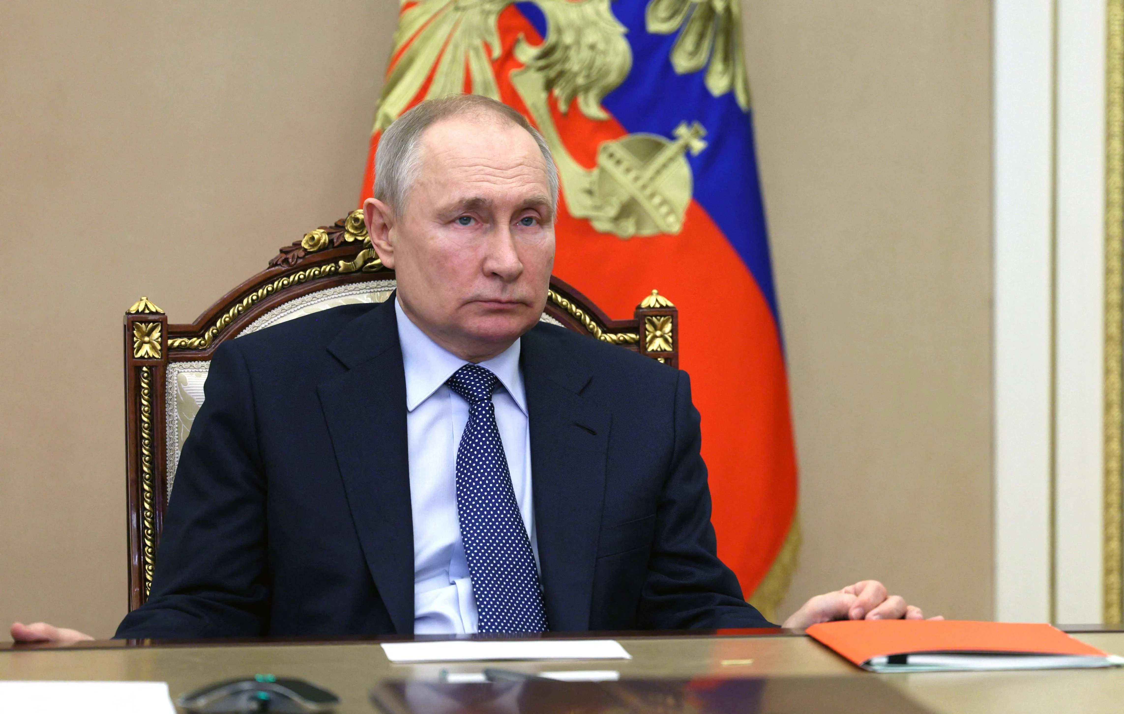 Vladimir Putin chairs a Security Council meeting in Moscow on March 31.