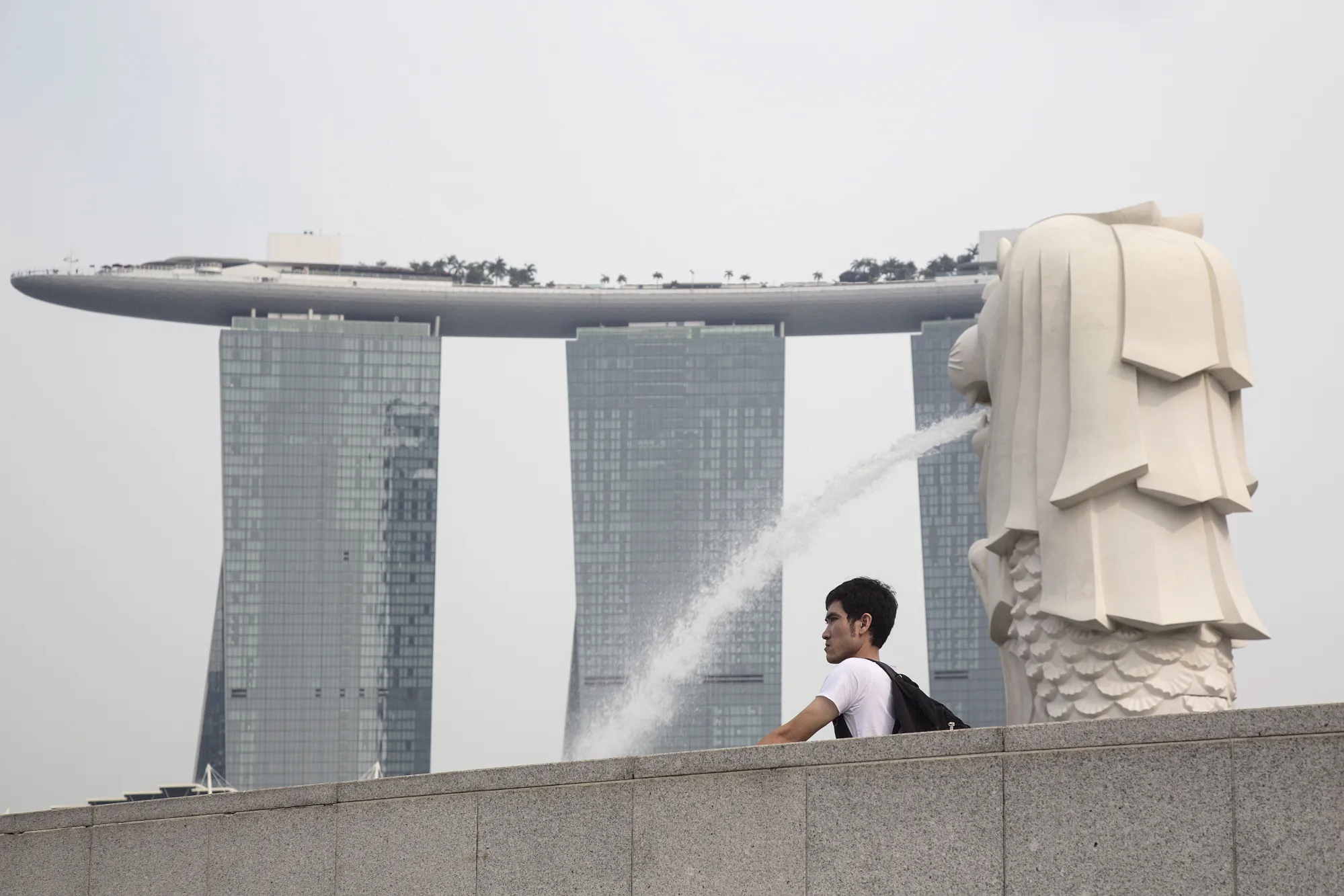 シンガポール通貨庁、金融政策を据え置き－米関税の影響見極め - Bloomberg