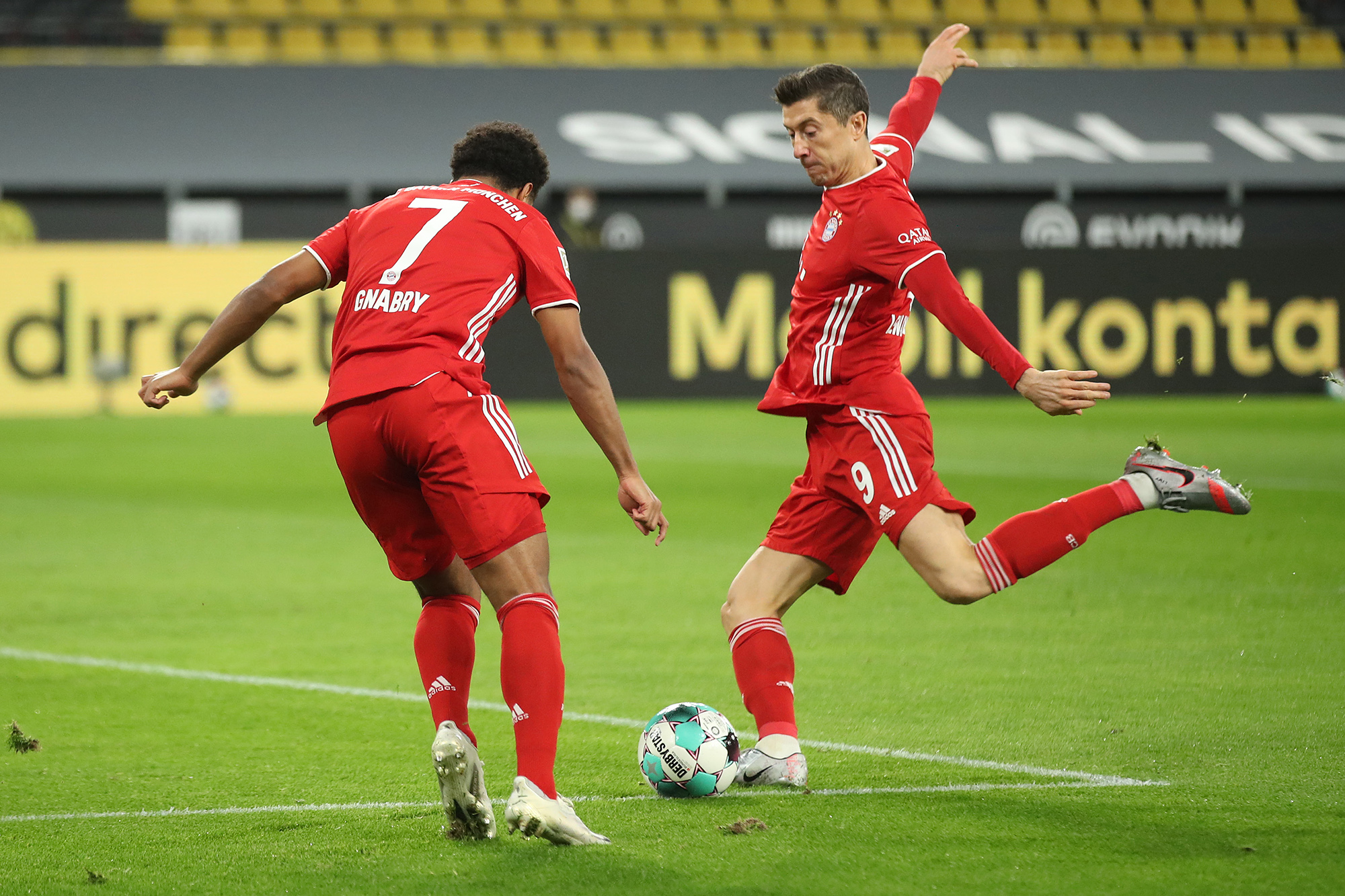 Robert Lewandowski tries to score during a match between Borussia Dortmund and FC Bayern Muenchen in Dortmund, Germany.