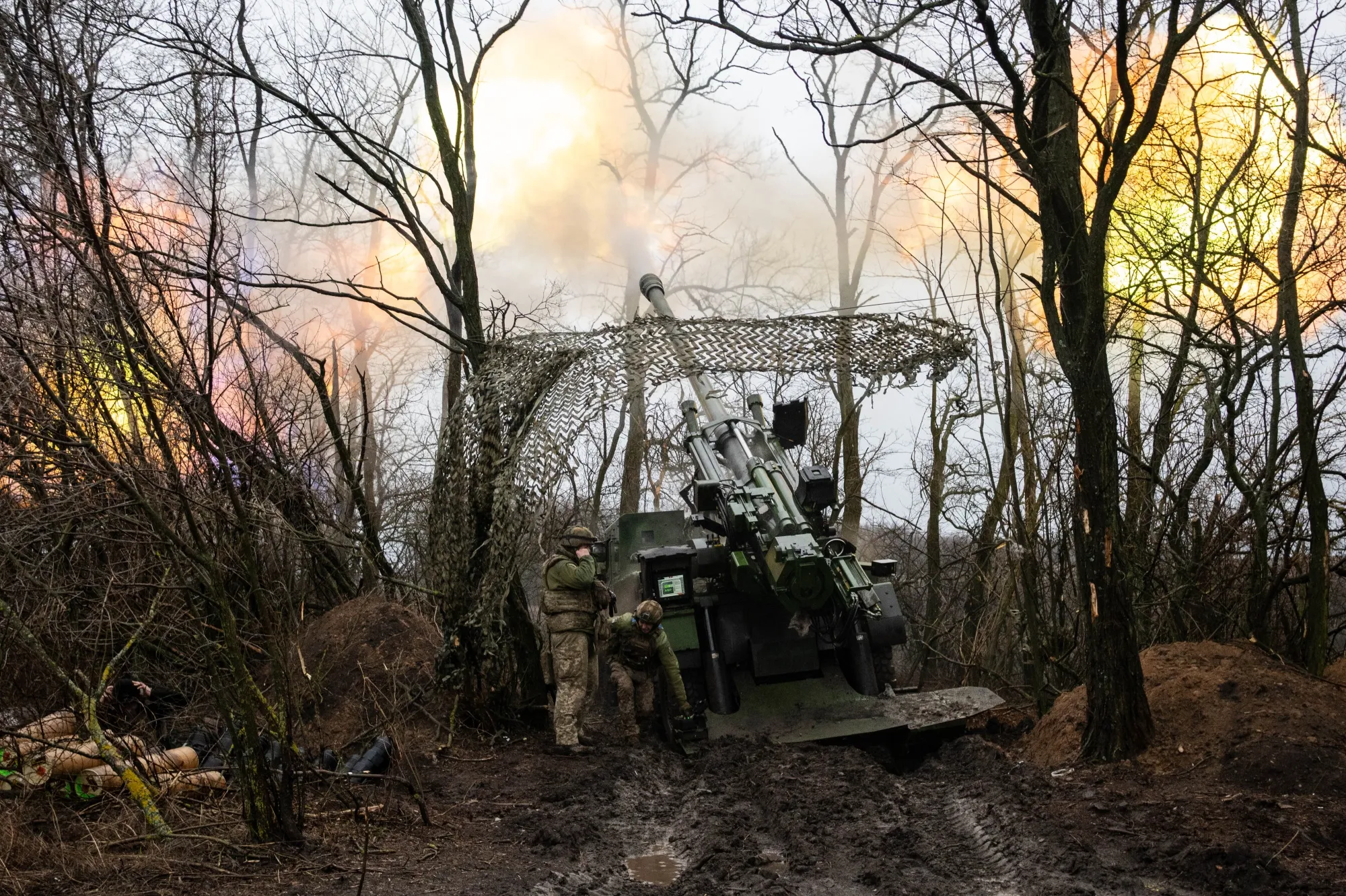 A self-propelled howitzer&nbsp;fires toward enemy lines from a concealed position near Pokrovsk, Donetsk Region, Ukraine on Jan. 11.&nbsp;