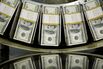 Stacks of one hundred dollar bills