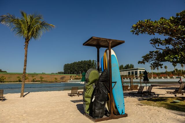 Surfboards stored on a rack at a beach area of the Boa Vista Village.