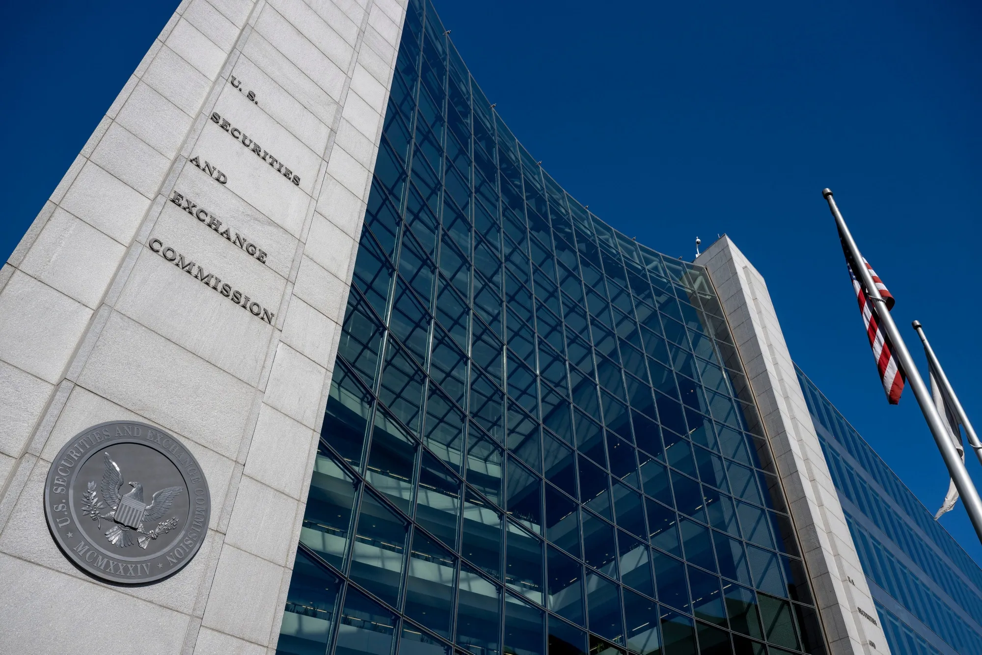 The SEC’s headquarters in Washington. The agency said it is prioritizing Trump’s proposal to change financial reporting requirements.&nbsp;Photo credit: Daniel Heuer/Bloomberg