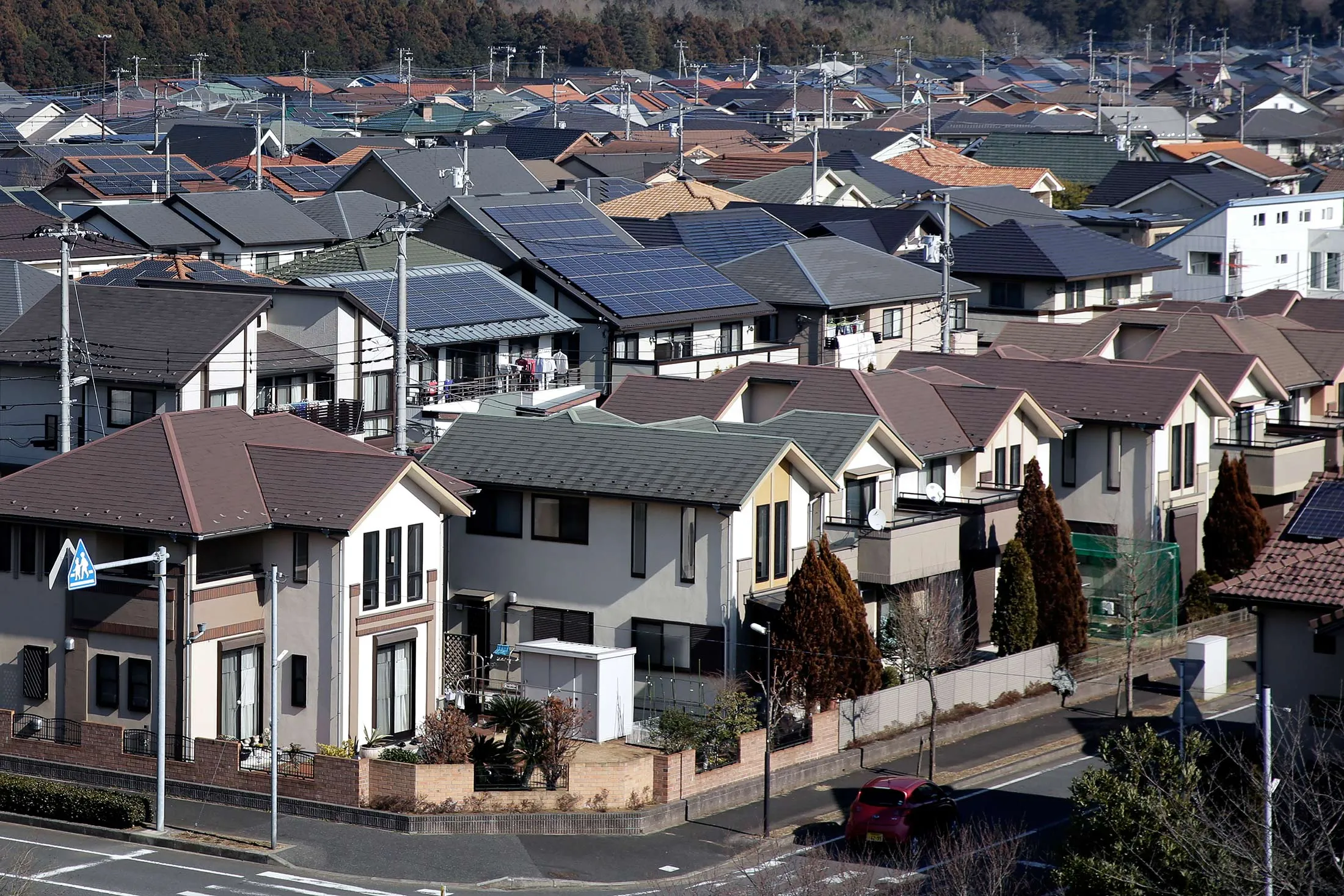 Houses stand in Inzai, Chiba Prefecture, Japan, on Wednesday, Jan. 27, 2016.
