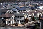 Houses stand in Inzai, Chiba Prefecture, Japan, on Wednesday, Jan. 27, 2016.
