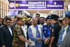 Muhammad Yunus with military officials upon his arrival at Hazrat Shahjalal International Airport in Dhaka on Aug. 8.