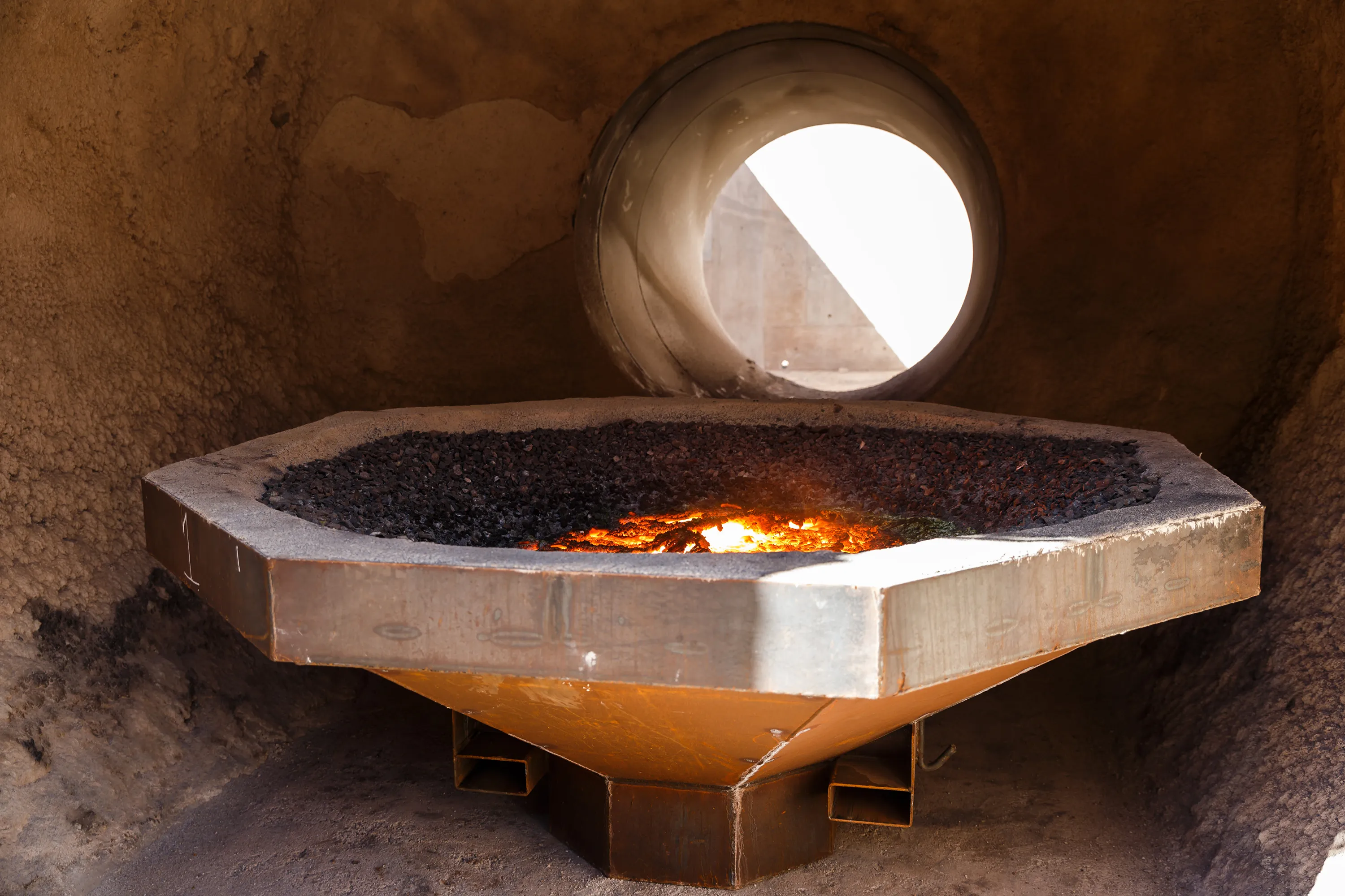 A furnace burns chrome ore at African Chrome Fields plant in Zimbabwe.