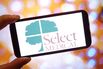 In this photo illustration, the Select Medical Holdings