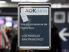 A board indicates the waiting line for passengers with the AOKpass at Charles de Gaulle airport on March 18.