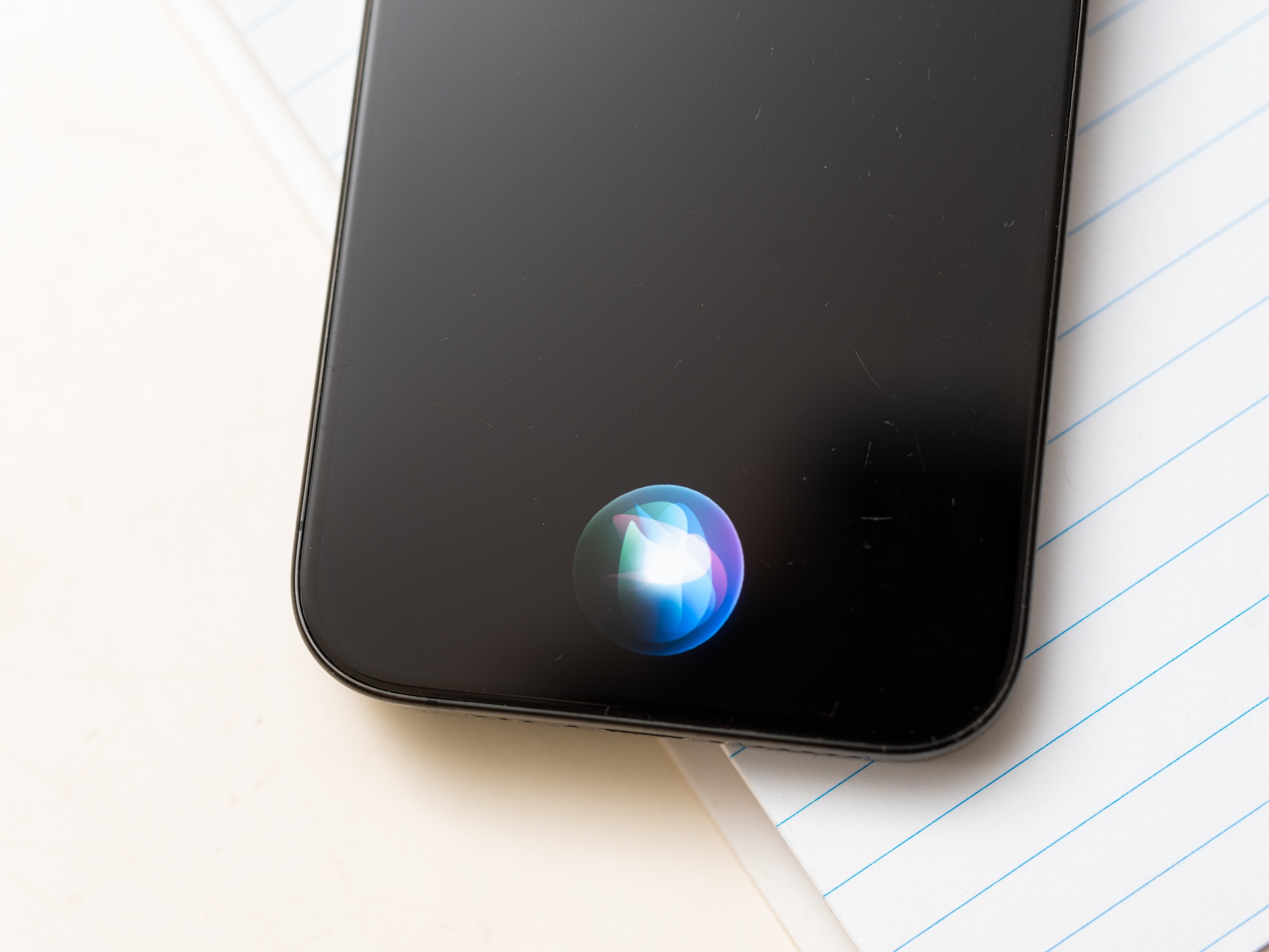 The Apple Siri prompt bubble on an iPhone. Photographer: Jason Henry/Bloomberg