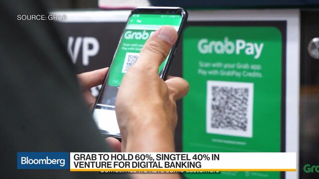Grab, Singtel Team Up to Bid for Singapore Digital Bank License - Bloomberg