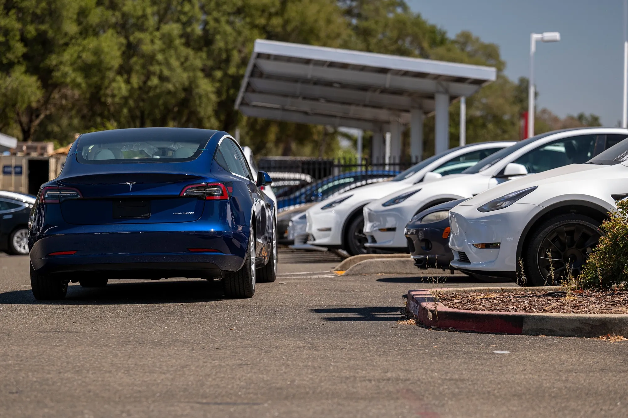 A Tesla Charging Station And Store Ahead Of Earnings Figures