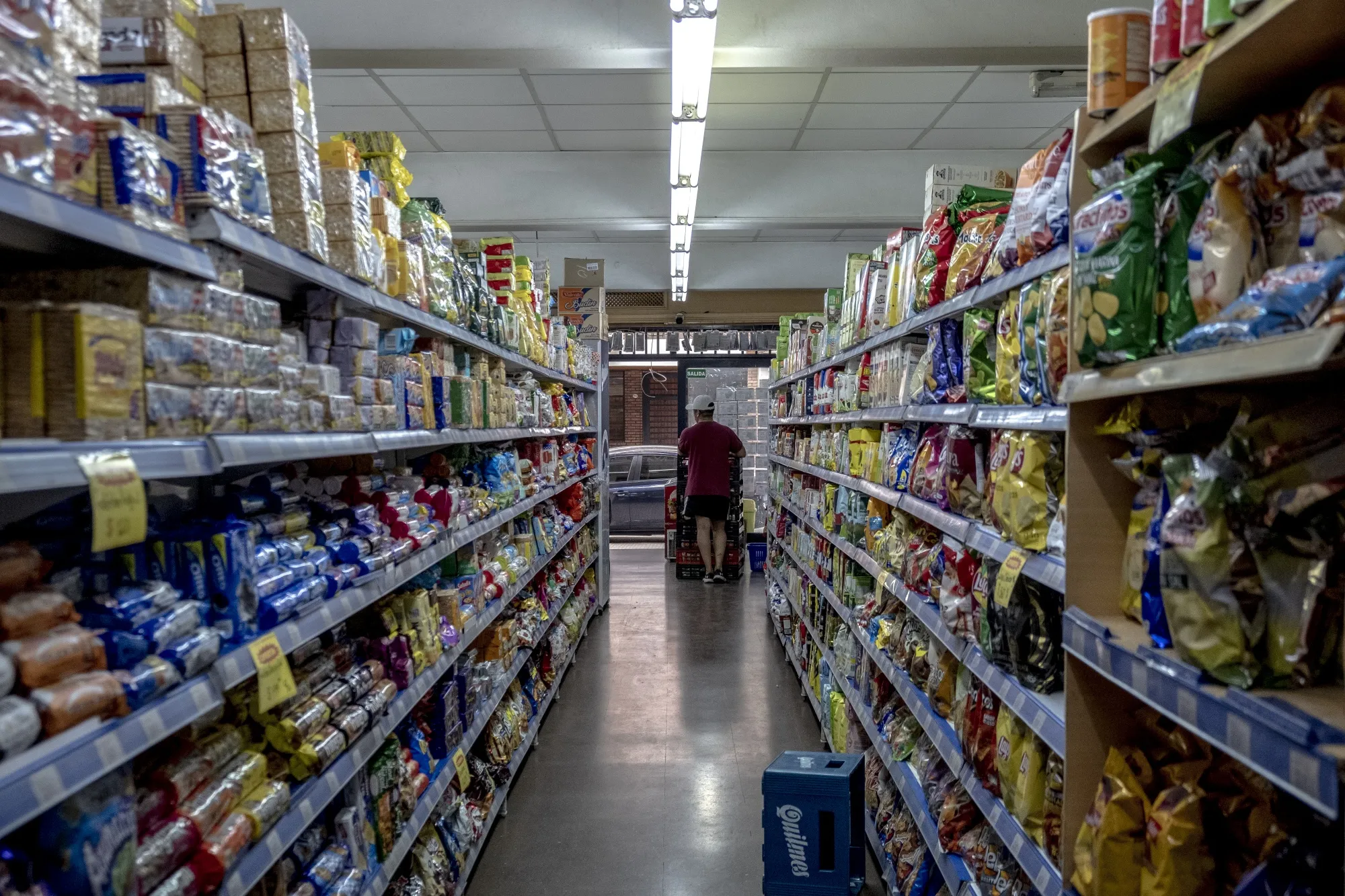A customer shops at a supermarket in Buenos Aires, Argentina.&nbsp;
