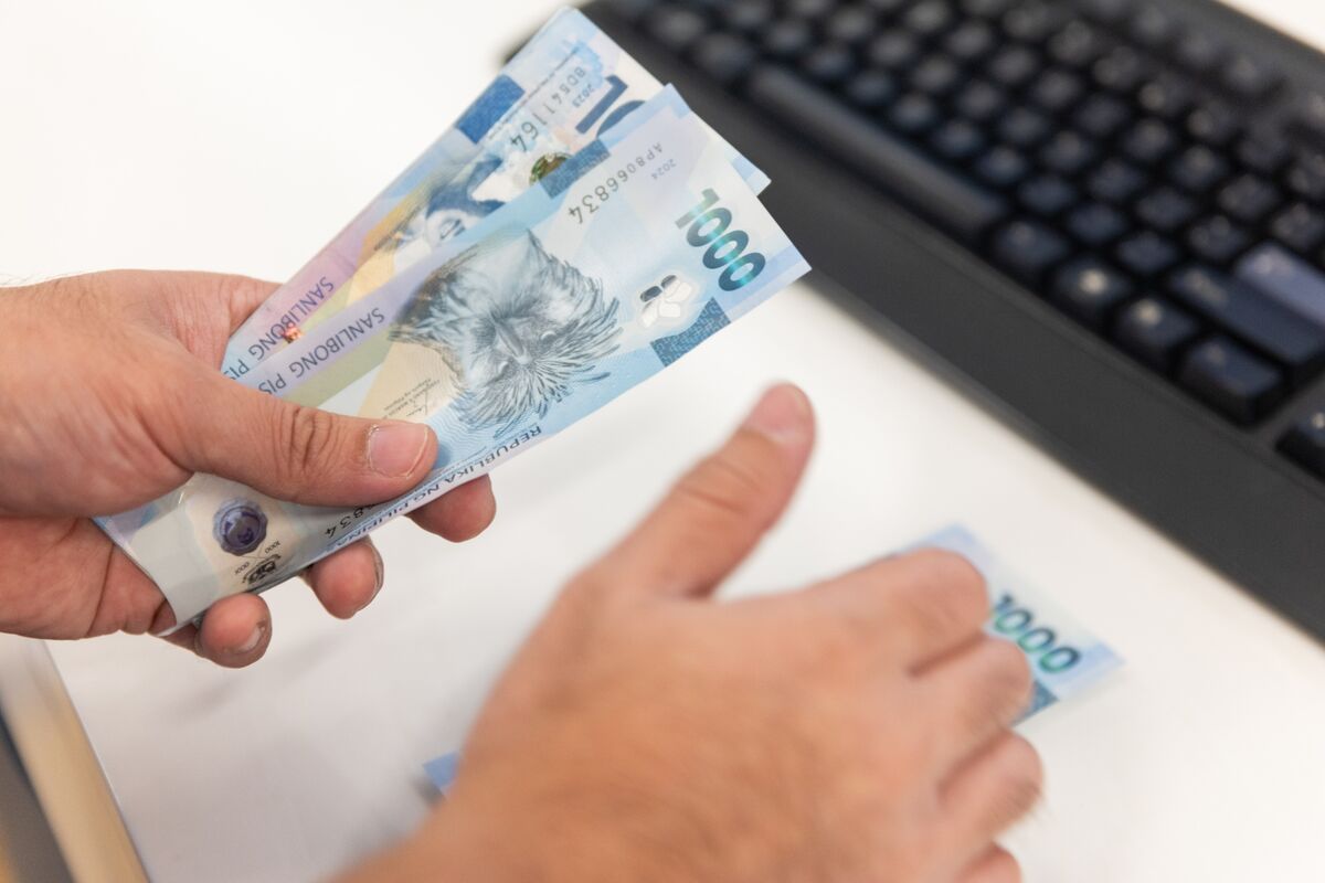 PHP/USD: Philippine Peso Set for Year-End Rebound on Holiday Remittances  Boost - Bloomberg