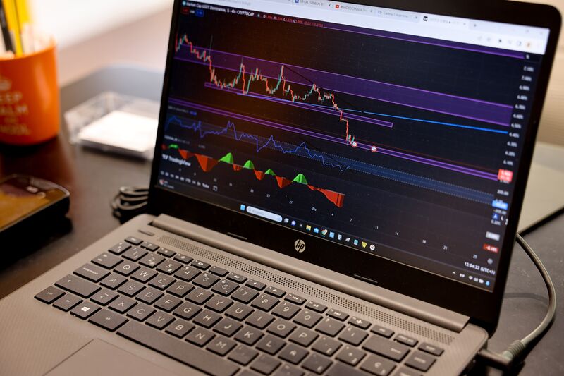 A cryptocurrency price chart on a laptop computer inside a BitBase cryptocurrency exchange in Barcelona, Spain, on Tuesday, Dec. 5, 2023. Bitcoin shrugged off a slide in global markets during a rally to a more than 19-month high, a sign of its decoupling from other assets.