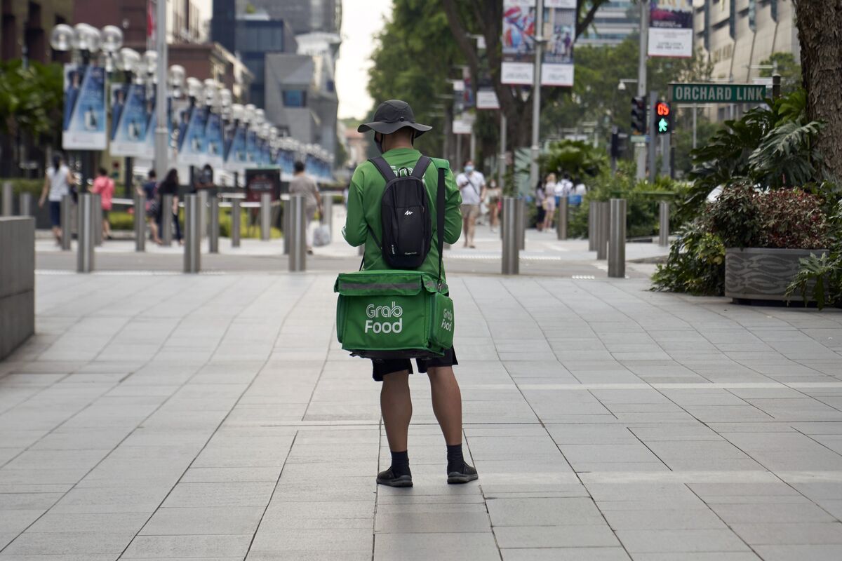 Grab Full-Year Revenue Forecast Trails Estimates as Asia Ride Market Slows