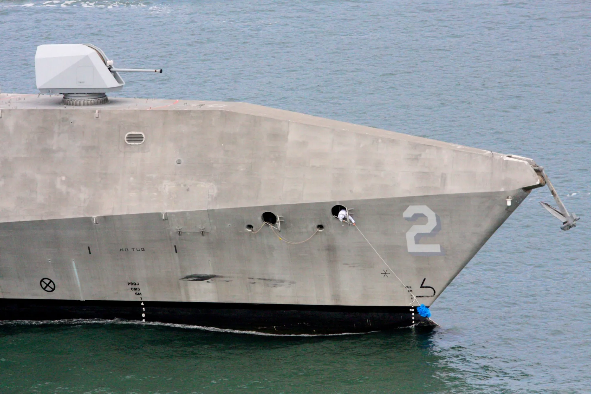 120502-N-ZZ999-006 SAN DIEGO (May 2, 2012) A Sailor secures the welcome lei on the bow of the littoral combat ship USS Independence (LCS 2) as she arrives in her homeport of San Diego. After two years of training off the coast of Florida, the ship's 23-day transit from Mayport, Fla., to San Diego, marks the successful completion of testing of the mine countermeasures mission package to detect, localize, and destroy mines in a tactical environment. Independence also transited the Panama Canal and conducted a port visit and operations with the Mexican navy. The littoral combat ship is a fast, agile, networked surface combatant designed to operate in near-shore environment, while capable of open-ocean tasking, and win against 21st-century coastal threats such as submarines, mines, and swarming small craft. (U.S. Navy photo by Lt. Jan Shultis/Released)