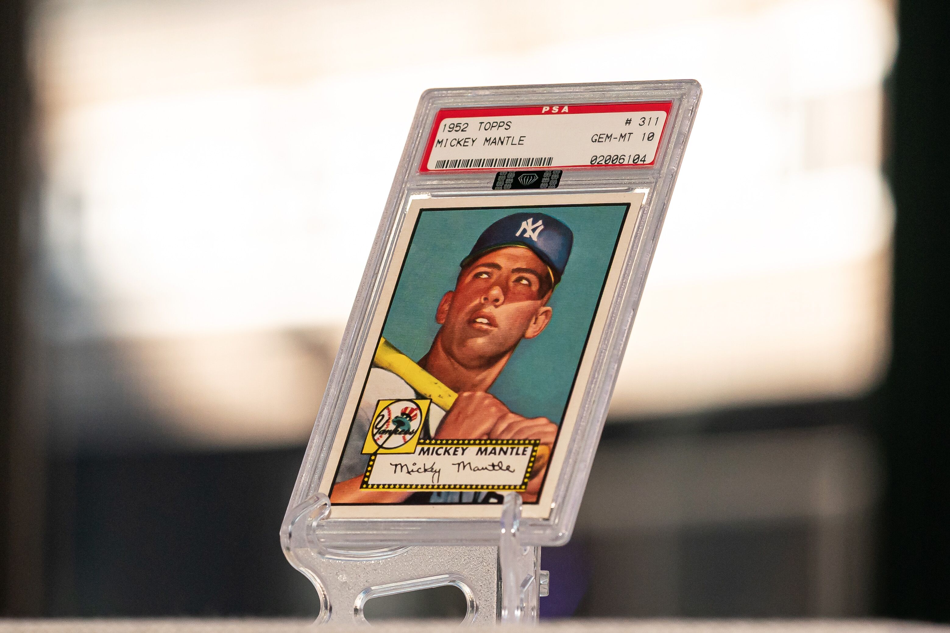 Mickey Mantle rookie card sold at auction for record $12.6 million