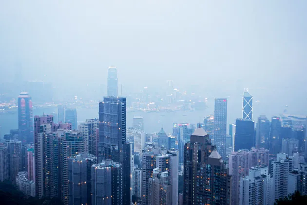 High-rises in the Central district of Hong Kong tower above Victoria Harbour
