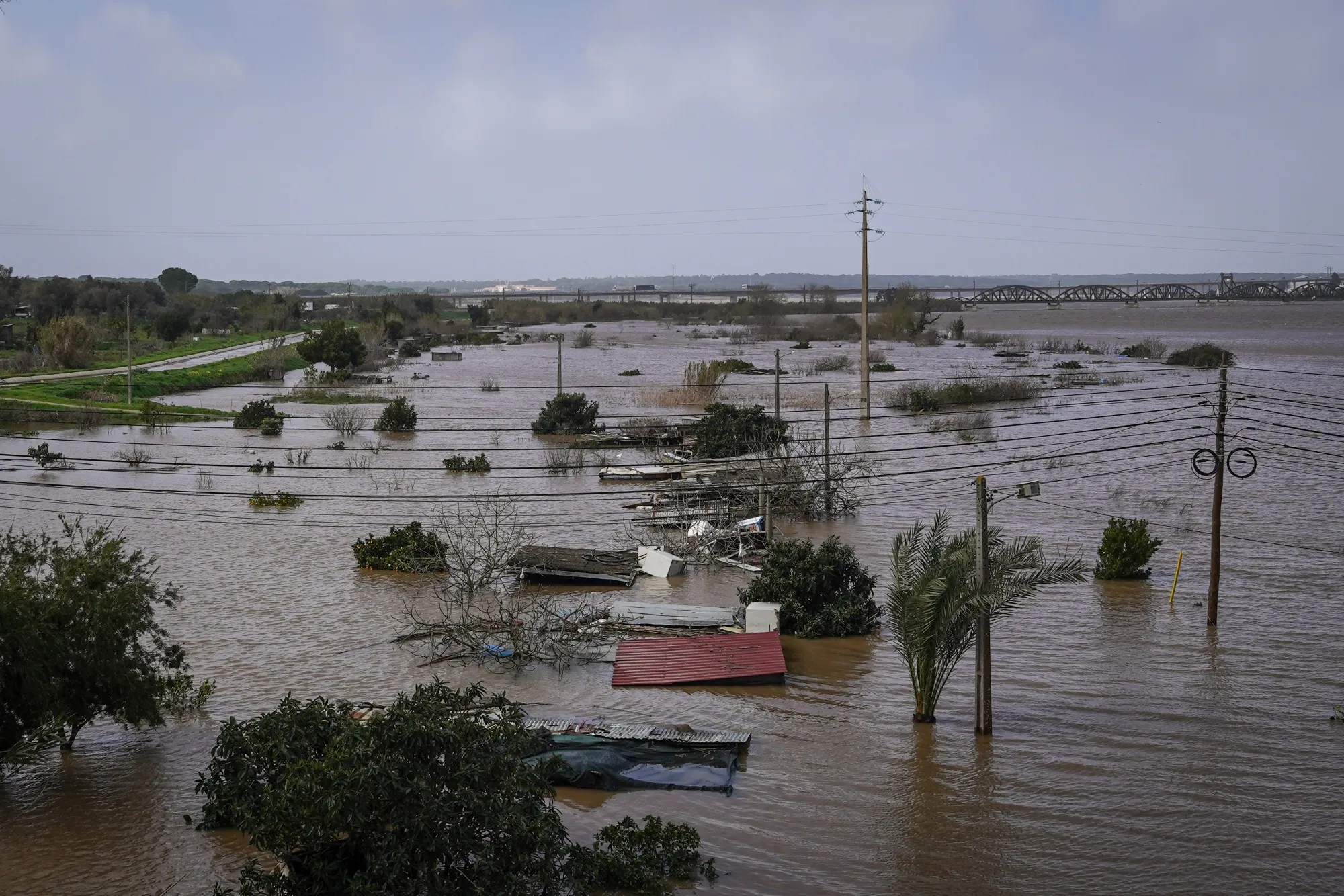 Farmland surrounding a village submerged by flooding from the Sado River in Alcacer do Sal.