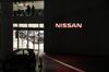 A Nissan Motor Co. showroom at the automaker's headquarters is illuminated at night in Yokohama, Japan.