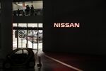 A Nissan Motor Co. showroom at the automaker's headquarters is illuminated at night in Yokohama, Japan.