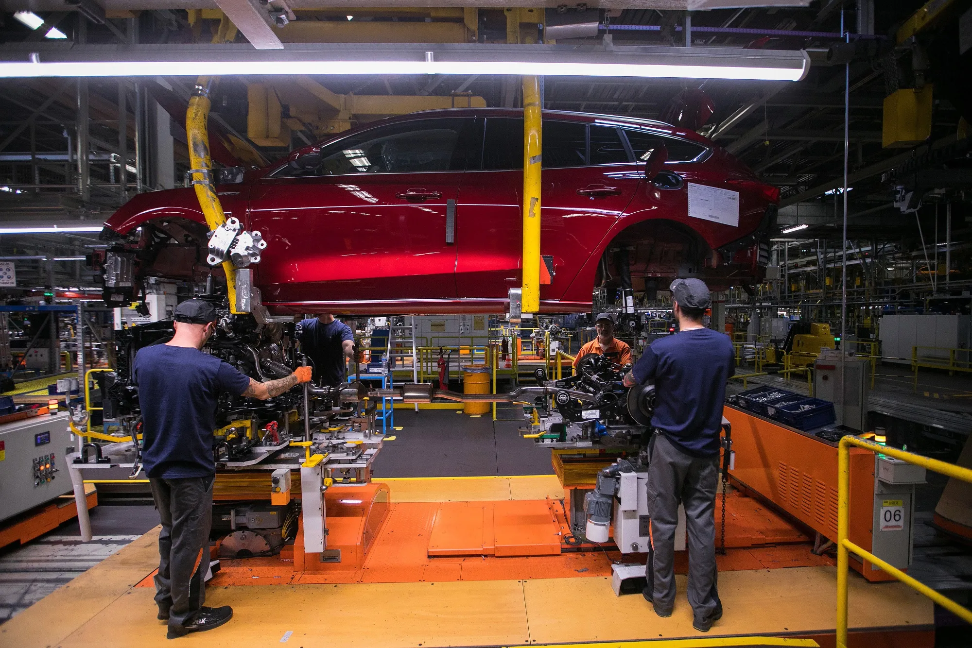 Workers assemble a Ford Focus automobile at the company’s plant&nbsp;in Saarlouis, Germany.