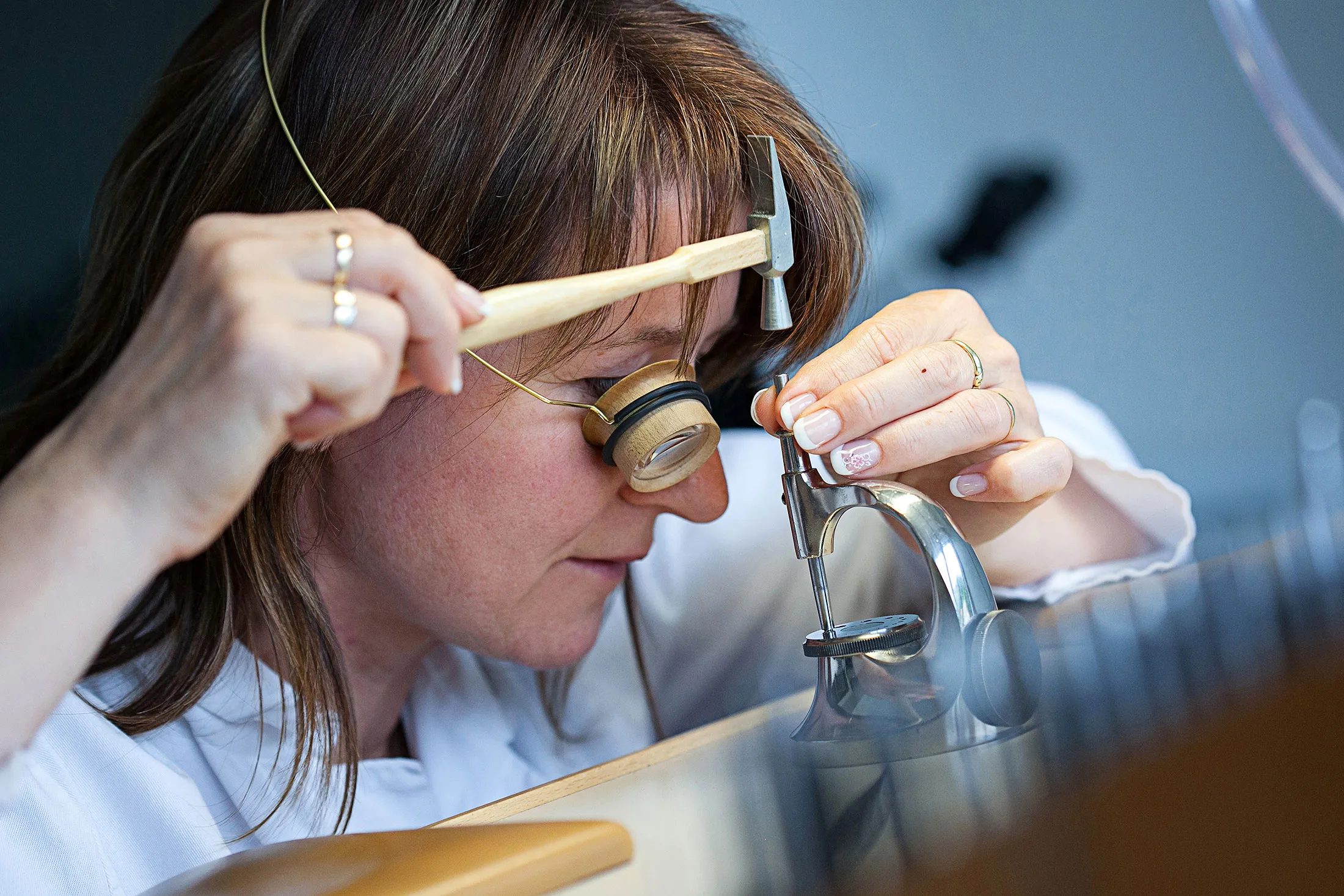 An horologist at Moritz Grossmann luxury watchmakers in Glasshuette, Germany.
