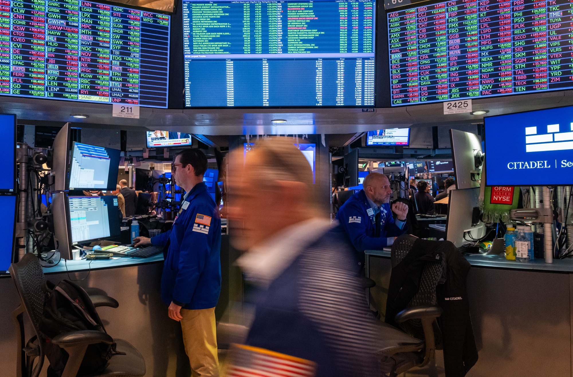Traders work on the floor of the New York Stock Exchange (NYSE) on February 13, 2026 in New York City. Markets were down in morning trading after a steep drop on Thursday, as investors continue to worry about AI's impact on the broader economy.