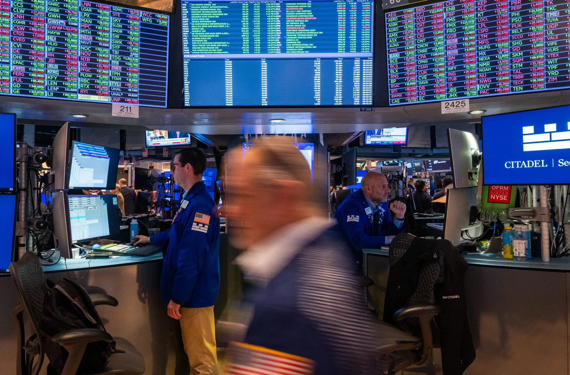 Traders work on the floor of the NYSE in New York on Feb. 13.