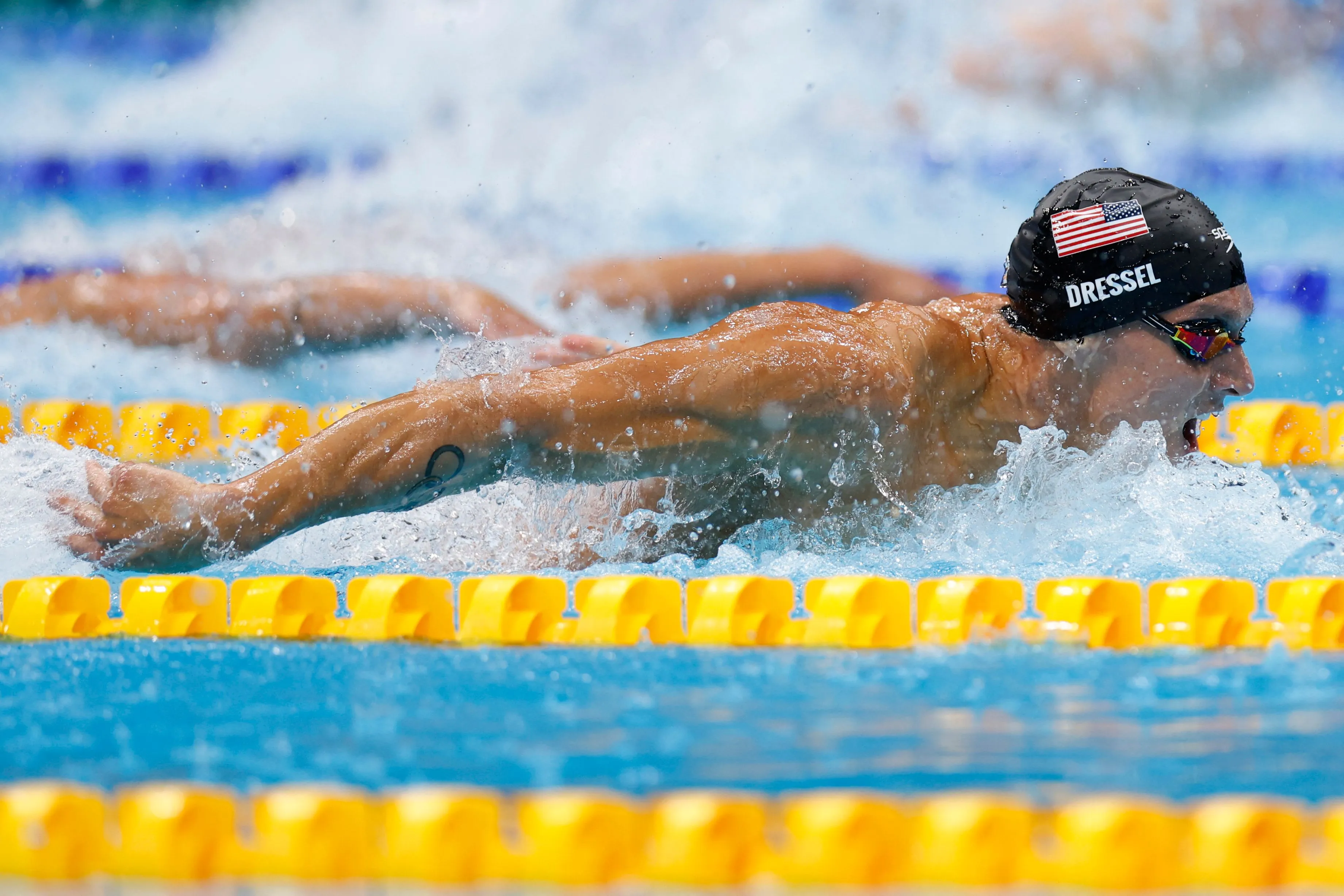 USA's Caeleb Dressel competes in the final of the men's 100m butterfly swimming event at the Tokyo Aquatics Centre in Tokyo, on July 31.