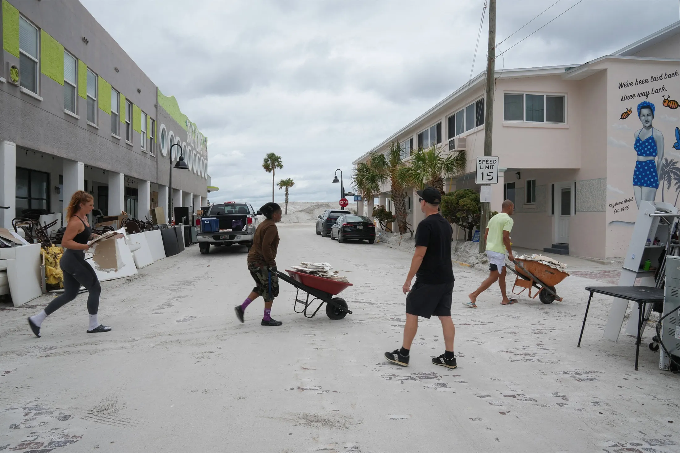 Residents clean up debris left by Hurricane Helene ahead of Hurricane Milton's expected landfall in&nbsp;St. Petersburg, Florida, on Oct. 7.
