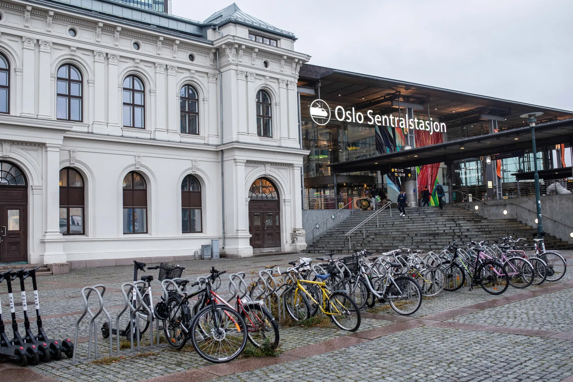 Bicycles sit near an entrance to Oslo Central Railway Station in Oslo in September 2020.