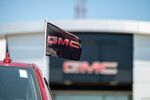 A General Motors Co. flag on a used truck at a dealership in Richmond, California, US, on Friday, June 21, 2024. CDK Global, a software provider to some 15,000 car dealers, was waylaid by debilitating cyberattacks this week that have had a crippling effect on the auto sales industry.