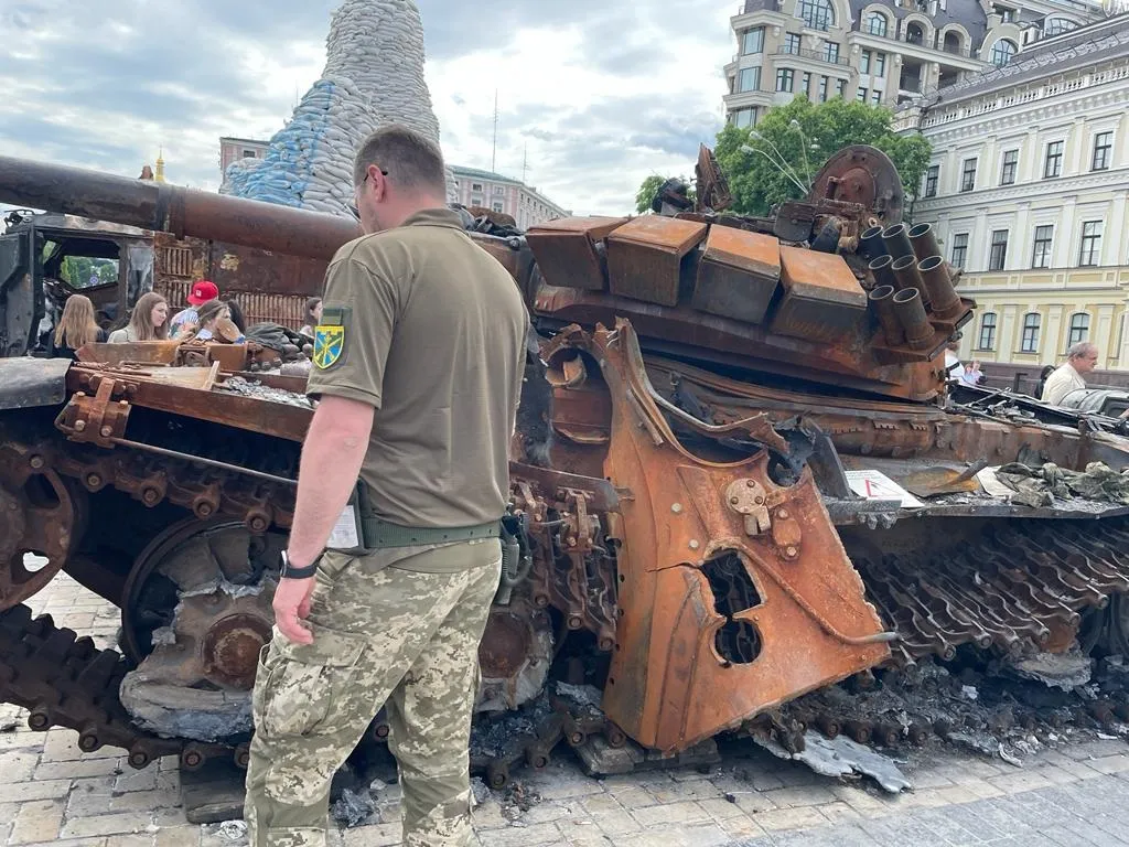 A burned-out Russian tank&nbsp;on Mykhaylivska square, Kyiv, on June 5.