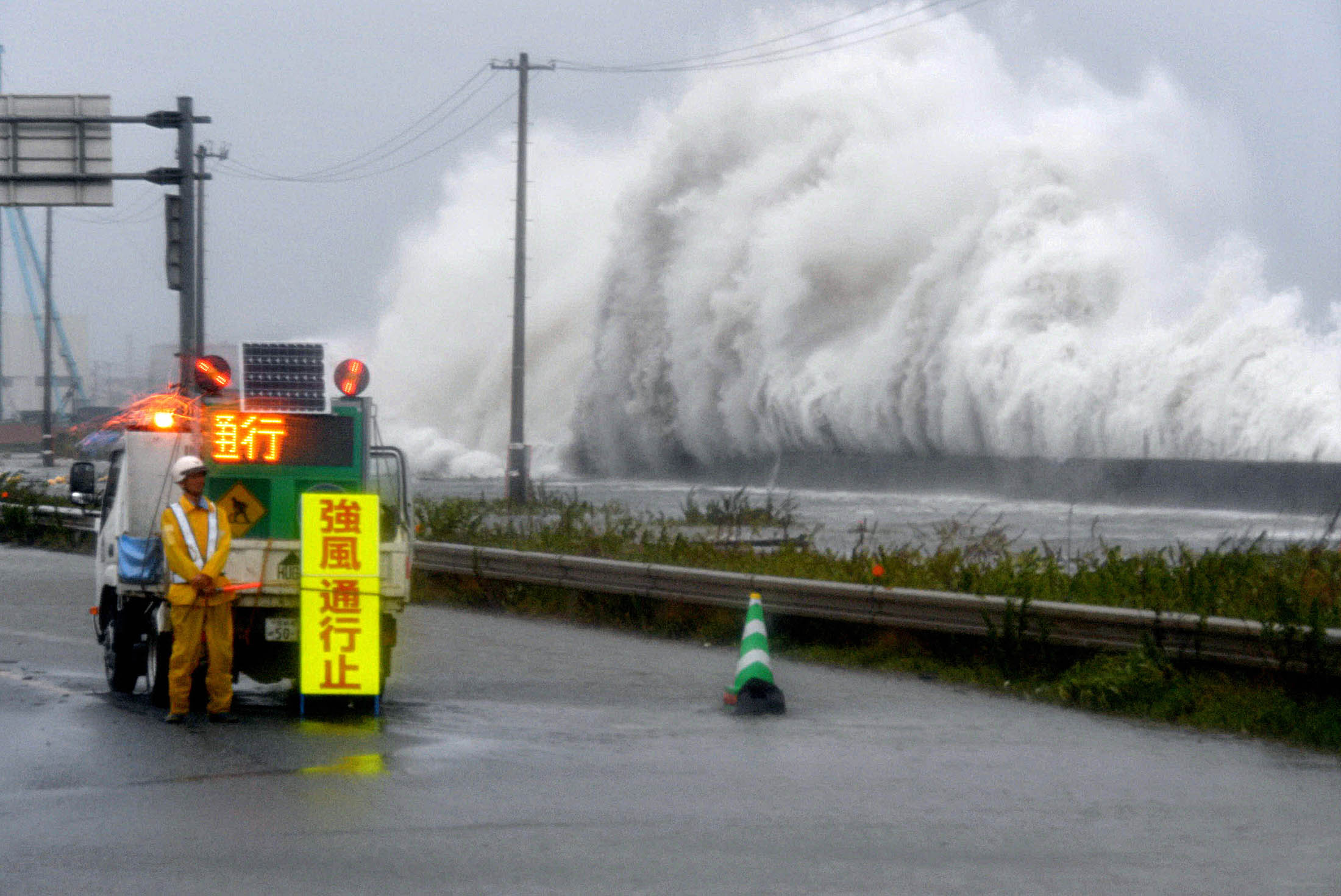 High waves crash a seawall in Miyagi prefecture as Typhoon Lionrock approaches Tohoku region on August 30.
