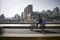A ZTO Express (Cayman) Inc. courier rides an electric bicycle along a road while making a delivery in Shanghai, China, on Friday, February 10, 2017. Photographer: Qilai Shen/Bloomberg