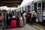 Ukrainian refugees board a train to Warsaw, in Przemysl, southeastern Poland, in April.