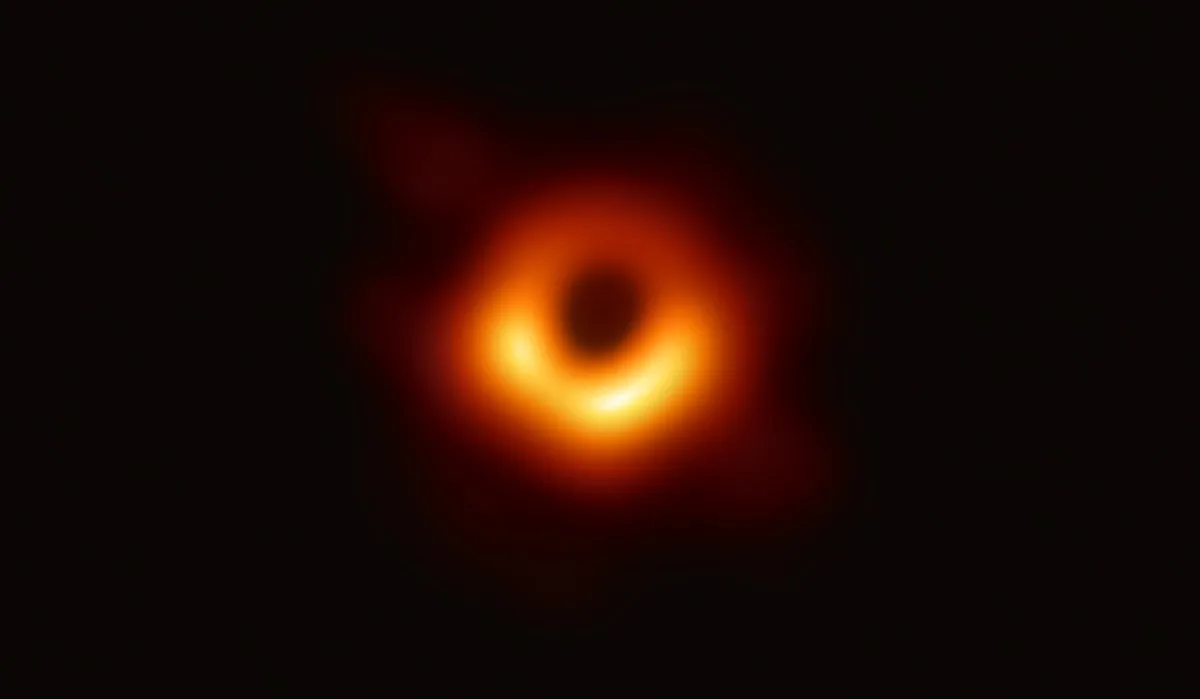 The Event Horizon Telescope captures a black hole at the center of galaxy M87,&nbsp;outlined by emission from hot gas swirling around it under the influence of strong gravity near its event horizon.