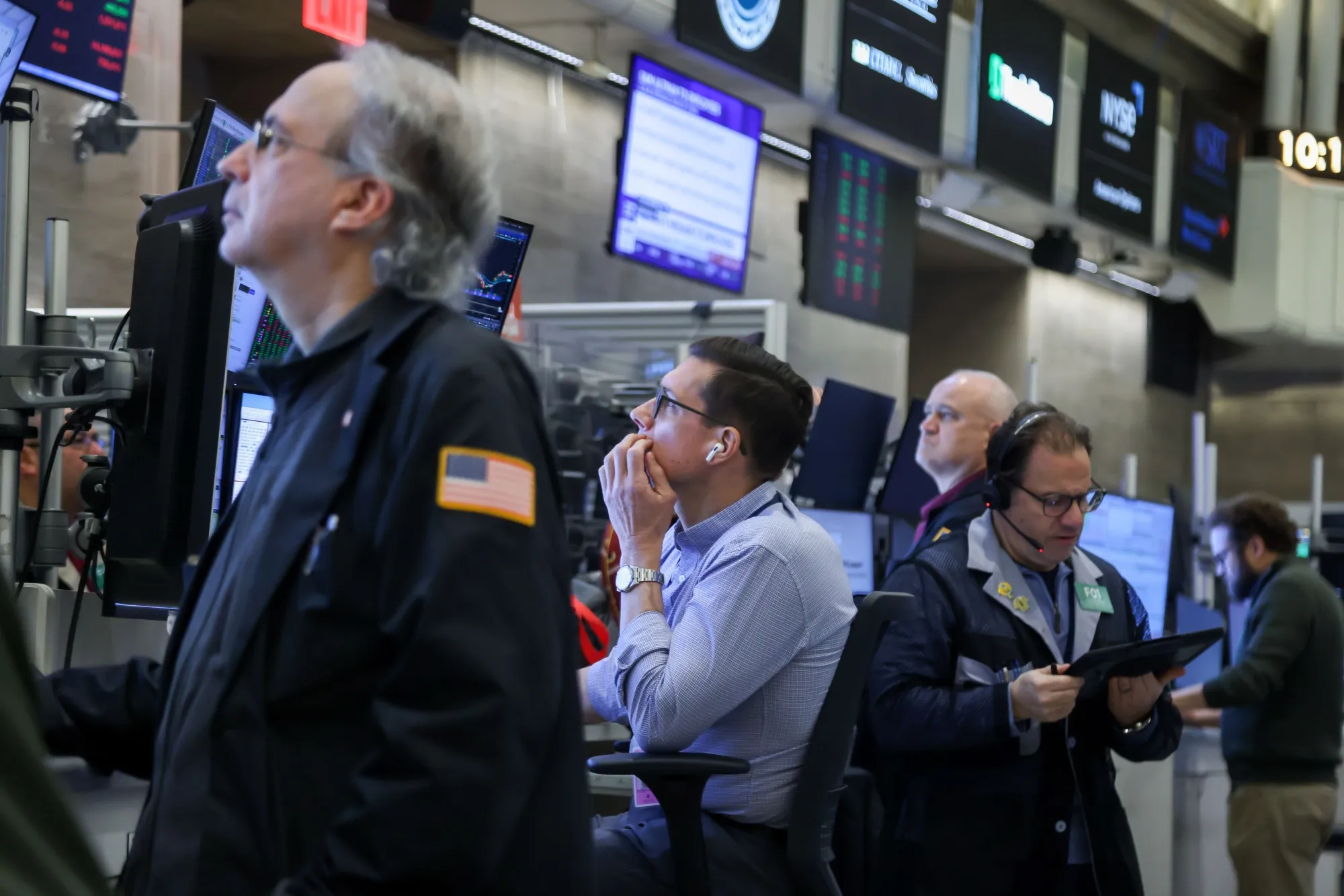 Traders work on the floor of the New York Stock Exchange.