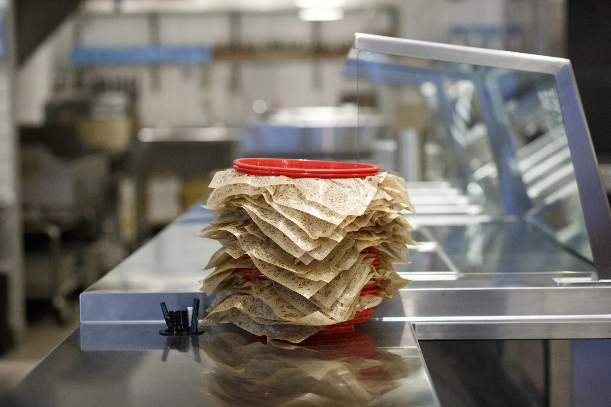 Food baskets sit on a counter at a Chipotle in Chicago, Illinois